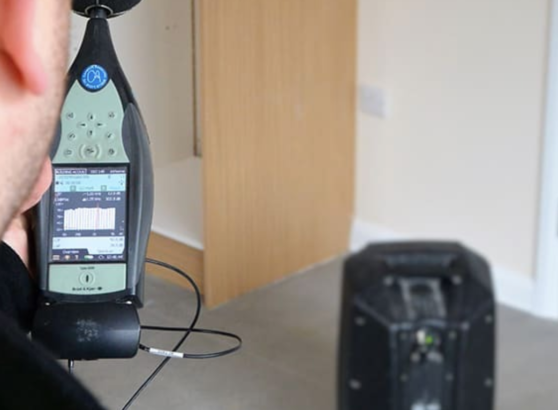 Sound Insulation Testing Engineer using Sound Insulation Testing Equipment